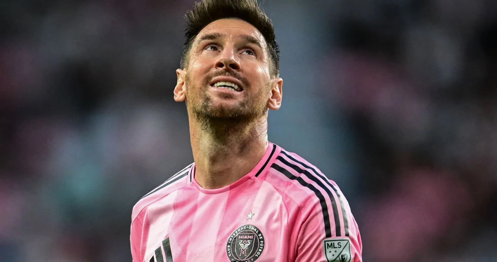 Player in pink jersey looking up during match Player in pink jersey looking up during match
