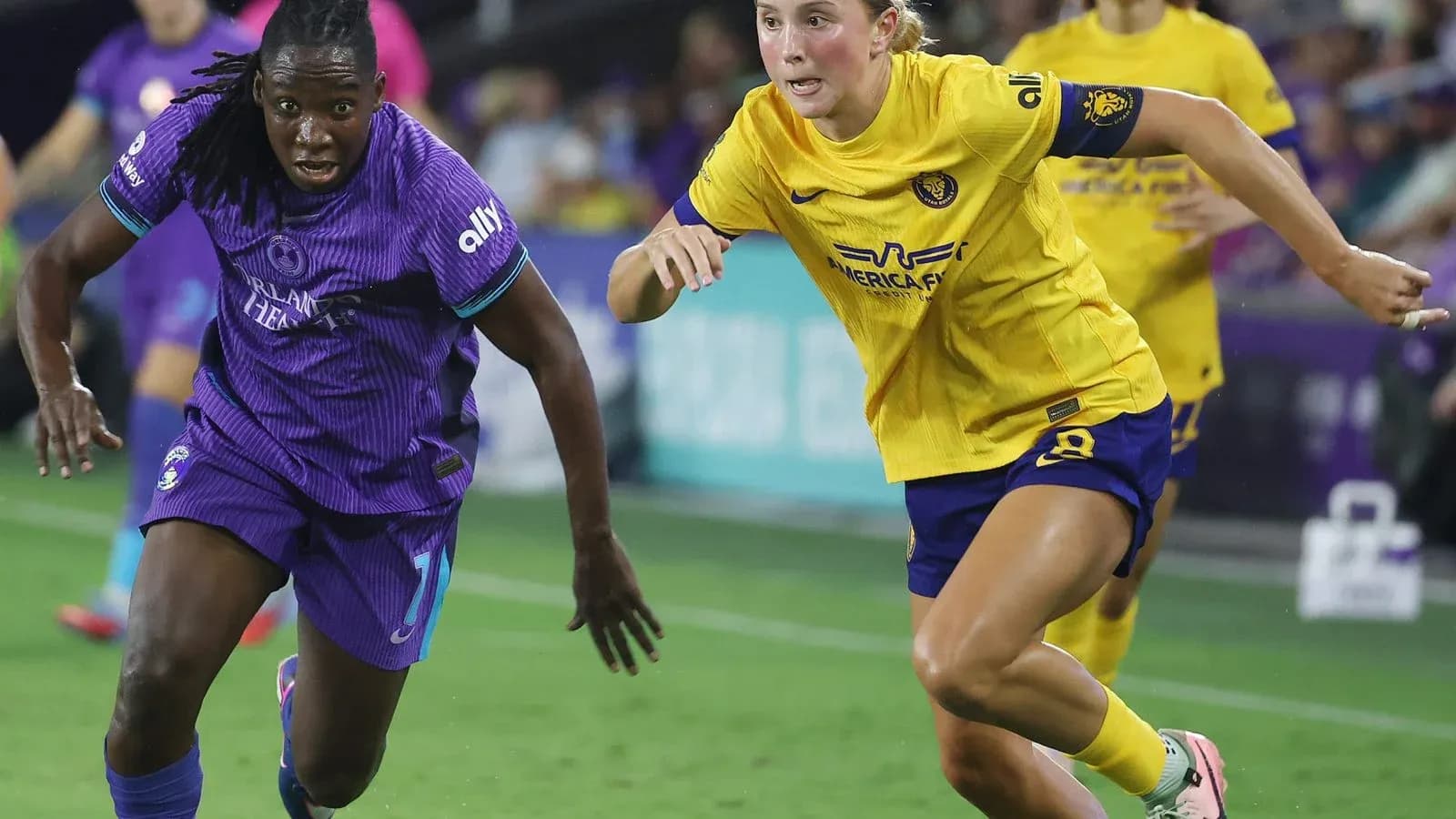 Two players competing during Orlando Pride match Two players competing during Orlando Pride match