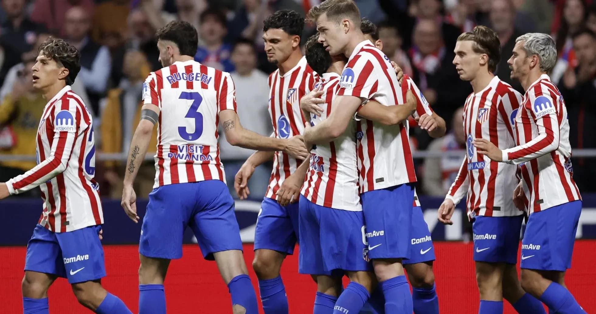 Atletico Madrid players celebrating a goal Atletico Madrid players celebrating a goal