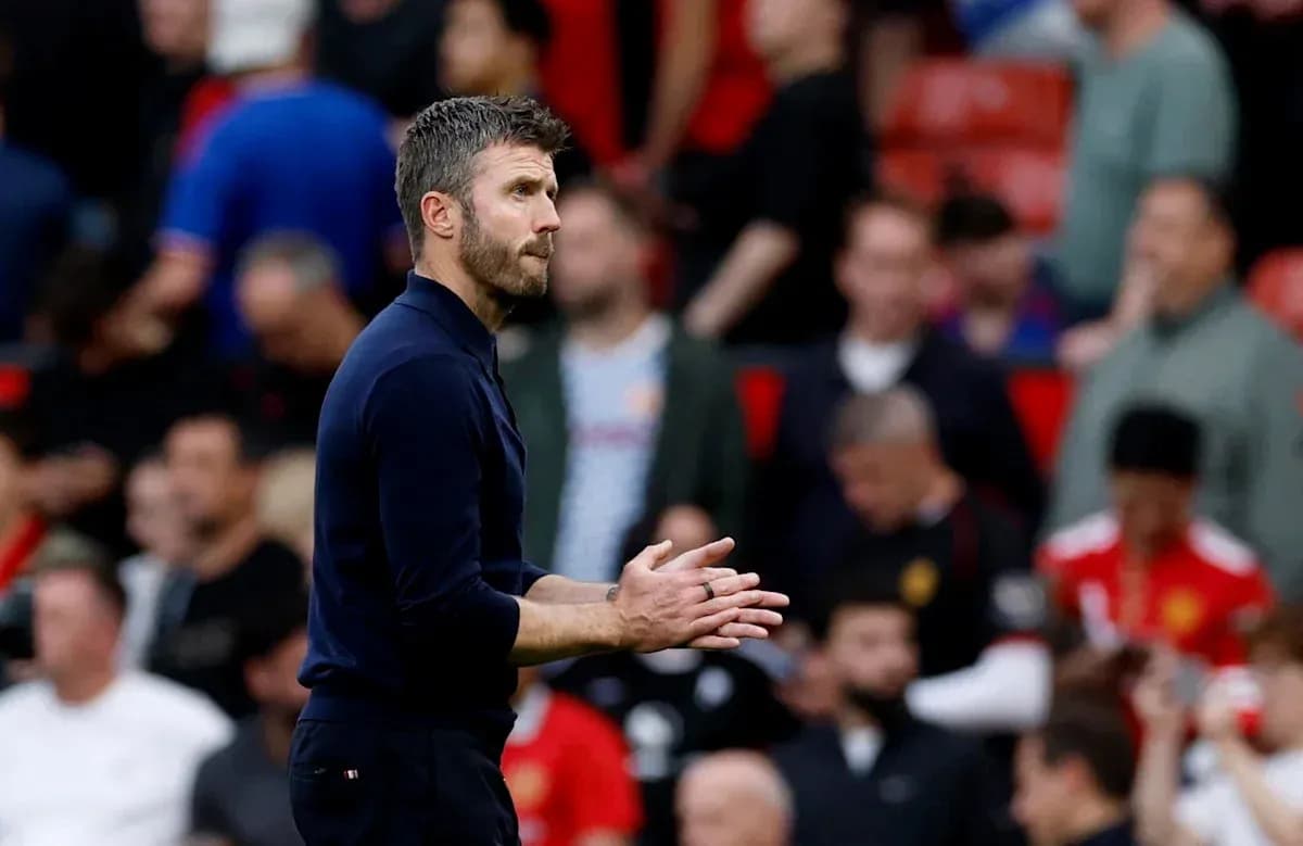 Manager clapping during match at Old Trafford Manager clapping during match at Old Trafford