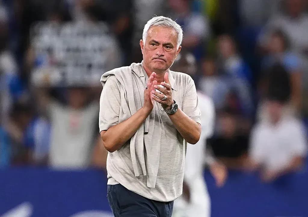 Manager applauding fans after the match Manager applauding fans after the match