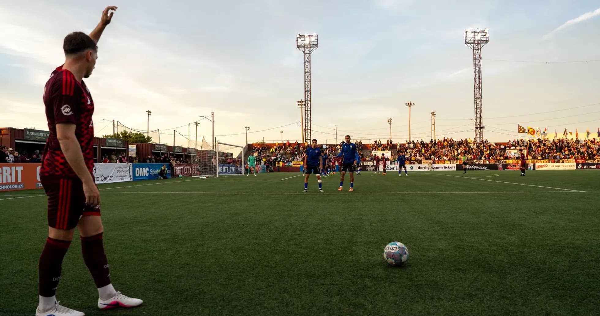 Player preparing for a free kick during match Player preparing for a free kick during match