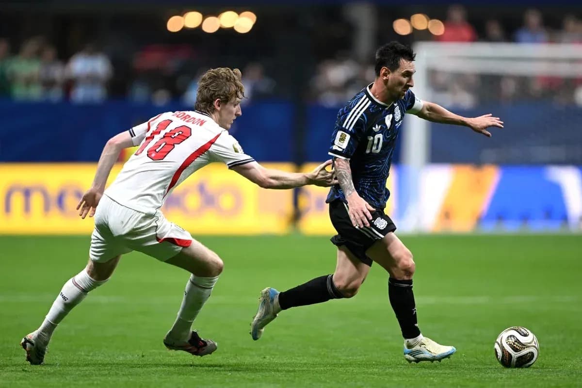 Player dribbling the ball while being chased Player dribbling the ball while being chased