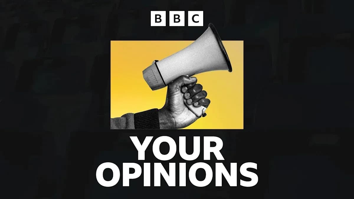 Hand holding a megaphone against yellow background Hand holding a megaphone against yellow background