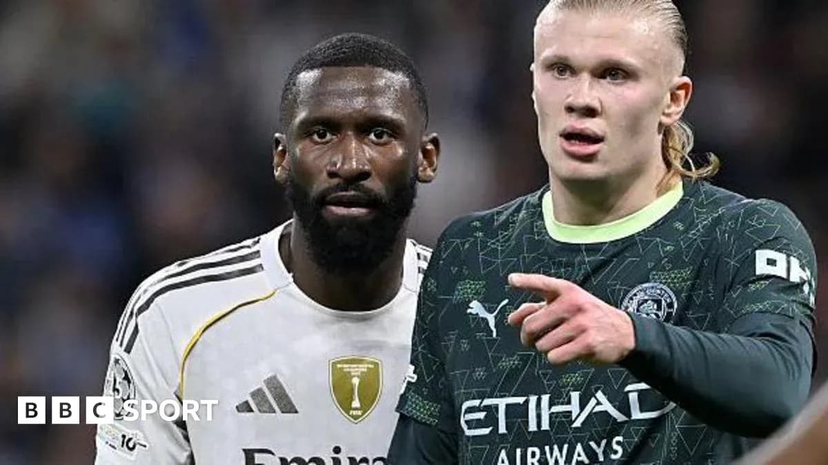 Two players discussing during a football match Two players discussing during a football match