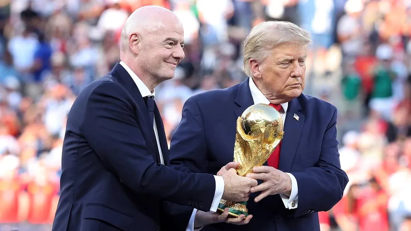 Gianni Infantino handing World Cup trophy to Donald Trump Gianni Infantino handing World Cup trophy to Donald Trump