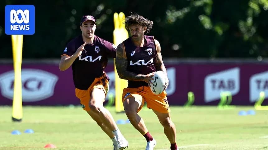 Players training with a football on the field Players training with a football on the field