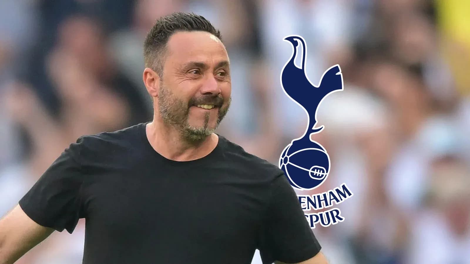 Coach celebrating with Tottenham Hotspur logo in background Coach celebrating with Tottenham Hotspur logo in background