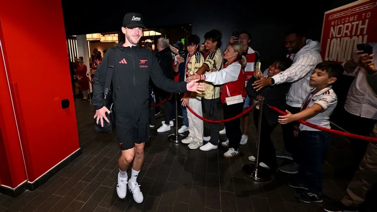 Player greeting fans while entering venue Player greeting fans while entering venue