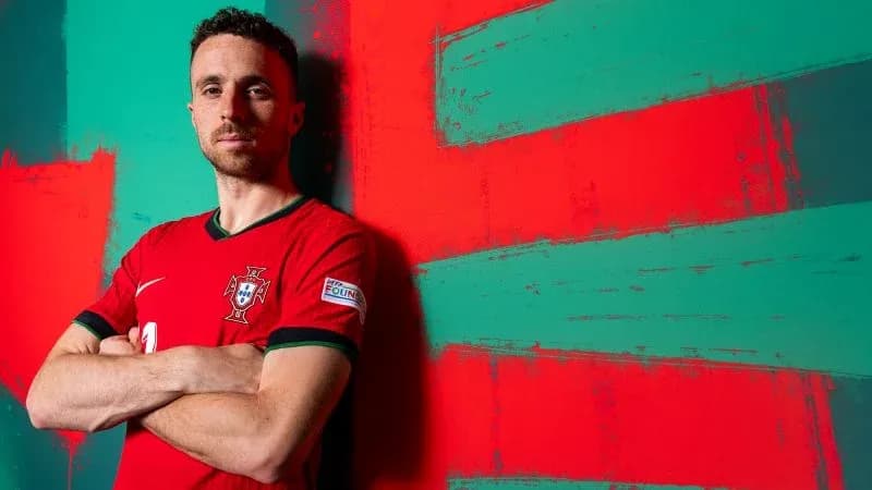 Football player posing in Portugal national team jersey Football player posing in Portugal national team jersey