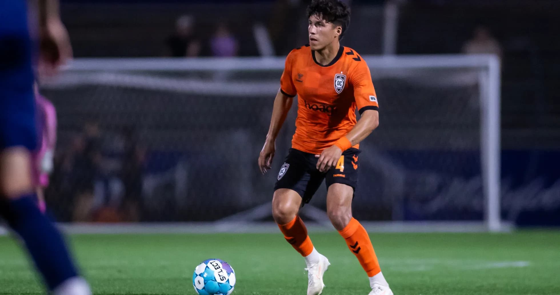 Player from Orange County SC in action Player from Orange County SC in action