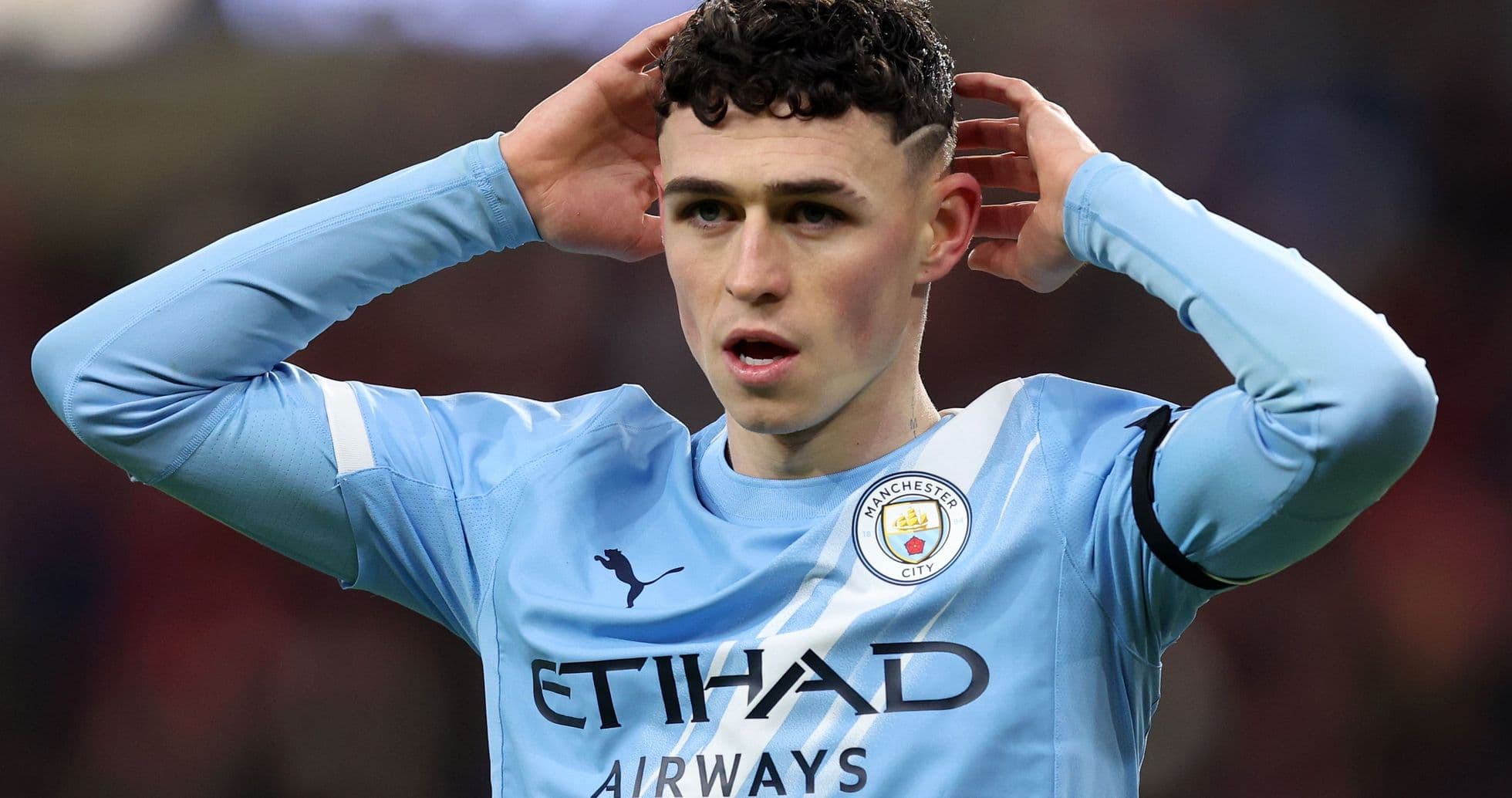 Phil Foden reacting during a Manchester City match Phil Foden reacting during a Manchester City match