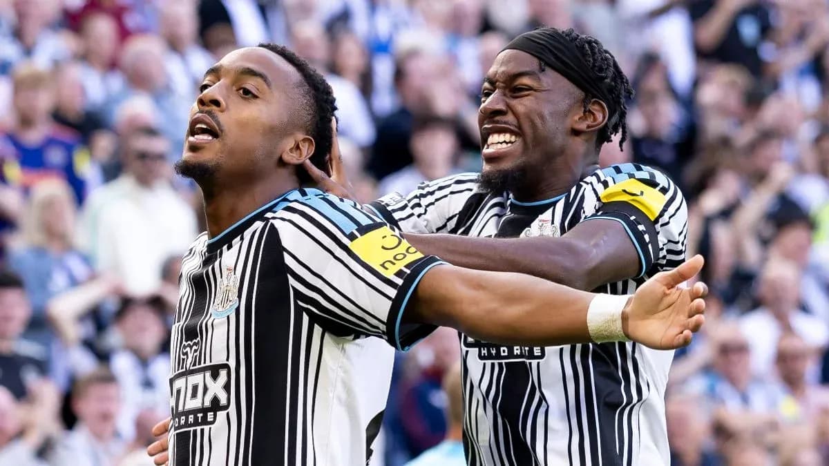 Newcastle players celebrating a goal during match Newcastle players celebrating a goal during match