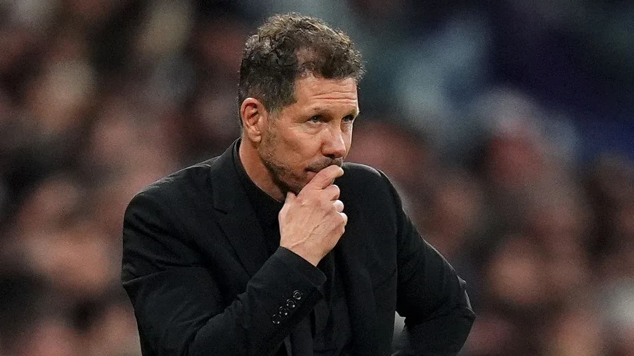 Coach contemplating during a football match Coach contemplating during a football match