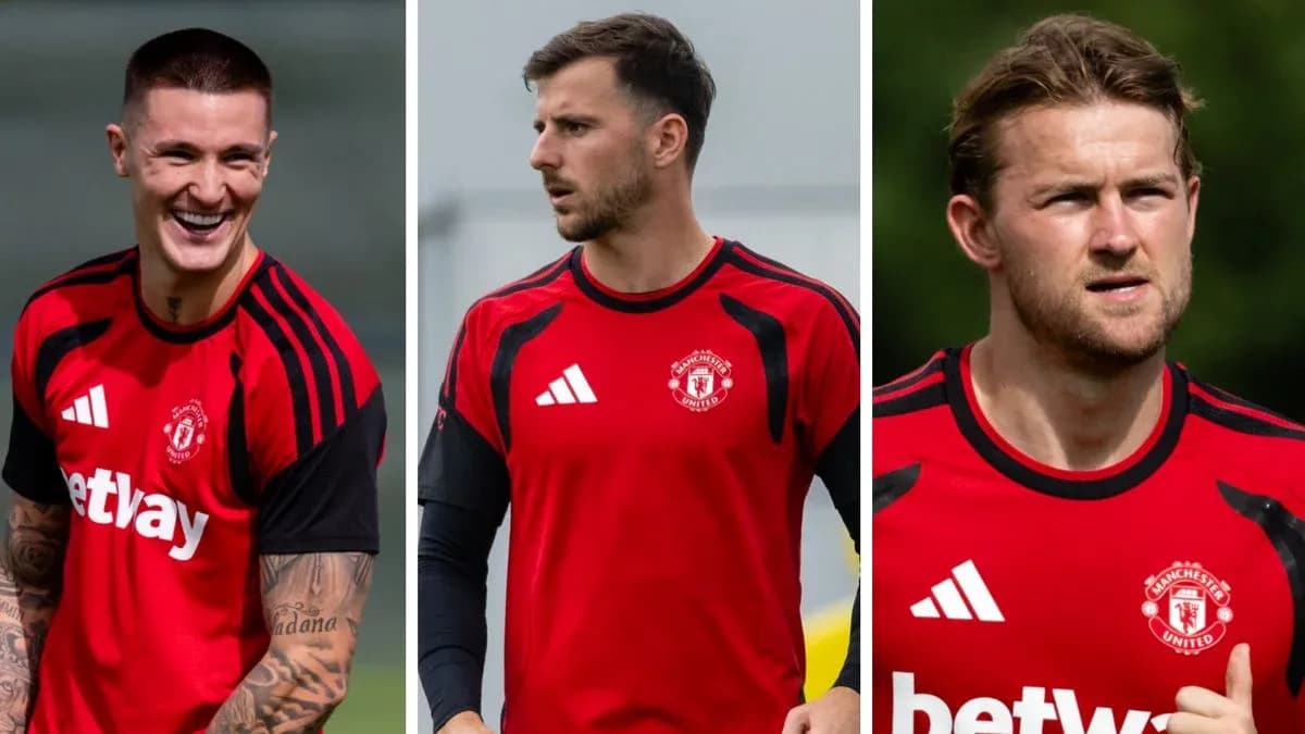 Three Manchester United players in training kits Three Manchester United players in training kits