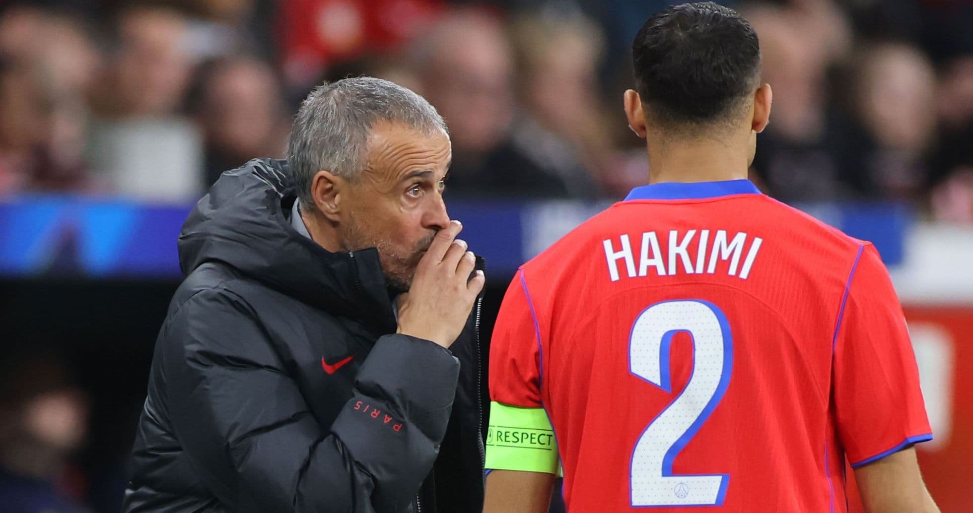 Coach giving instructions to Hakimi during match Coach giving instructions to Hakimi during match