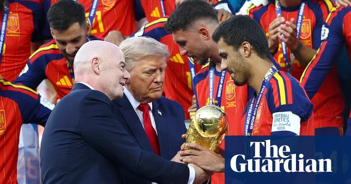 Officials presenting the FIFA World Cup trophy to Spain Officials presenting the FIFA World Cup trophy to Spain