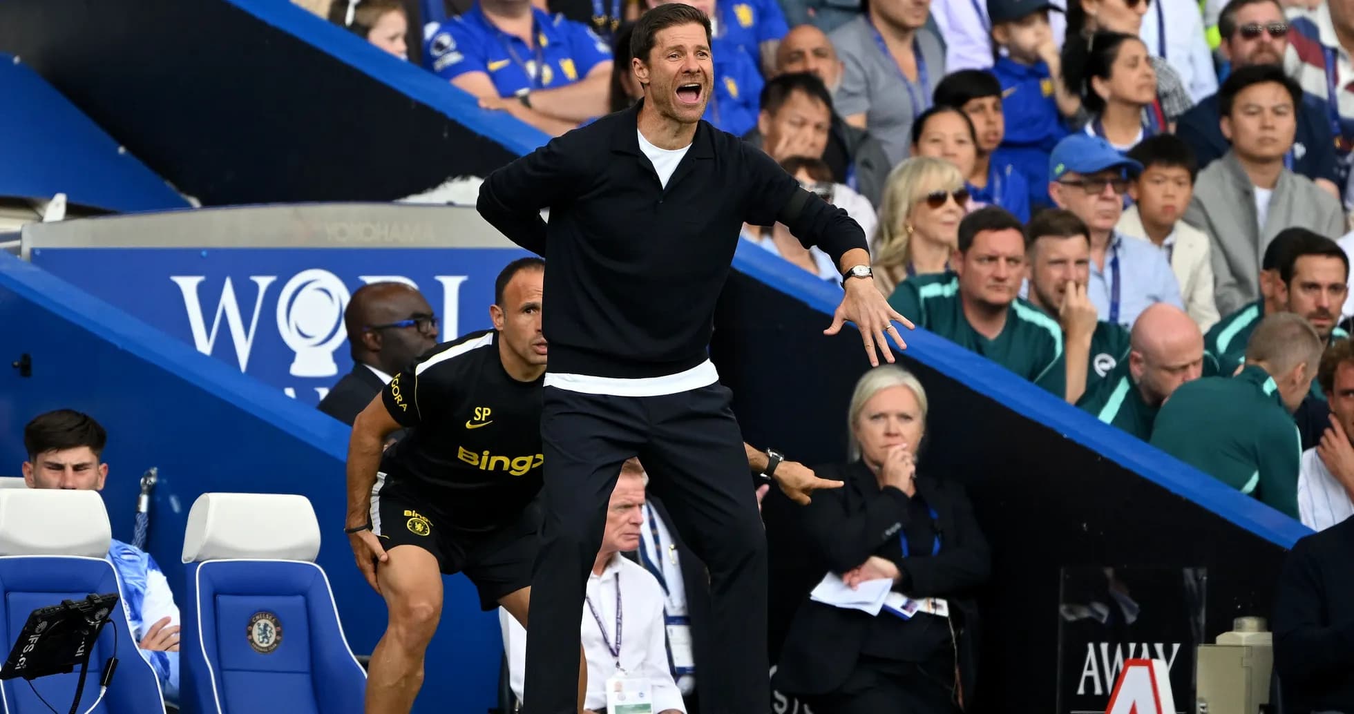 Coach shouting instructions from the sidelines during match Coach shouting instructions from the sidelines during match