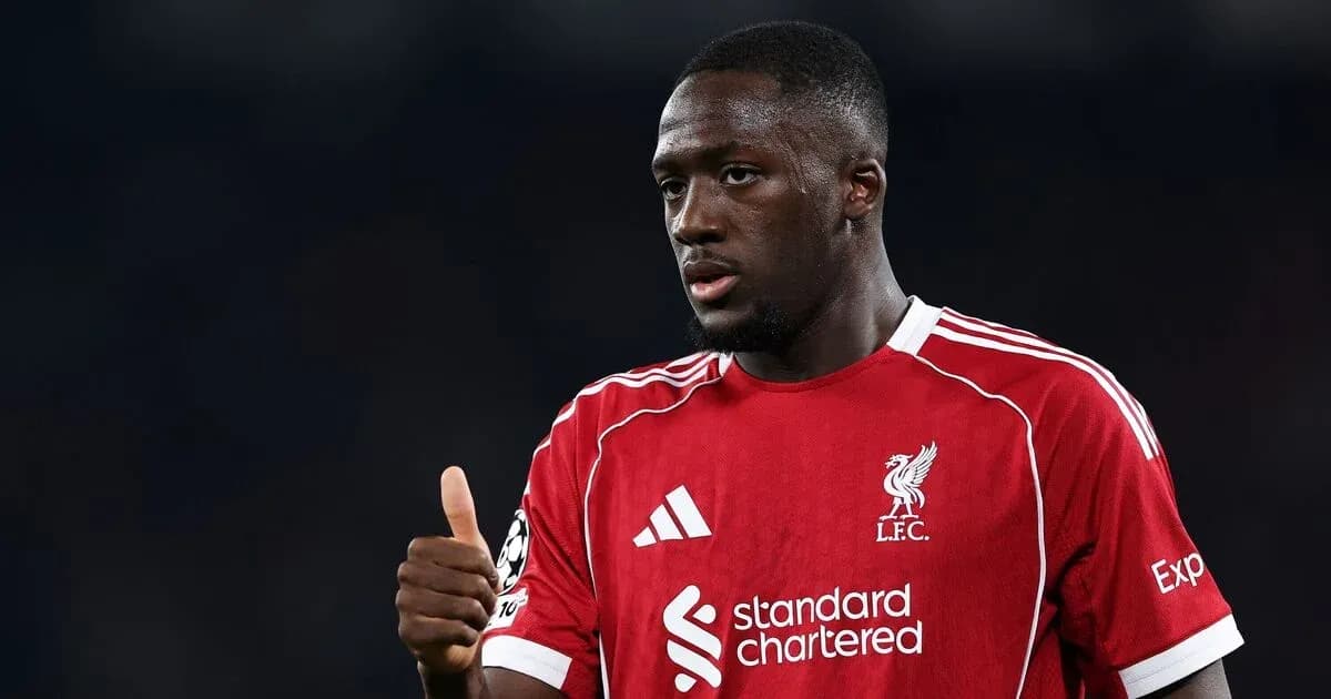 Player in red Liverpool kit giving thumbs up Player in red Liverpool kit giving thumbs up