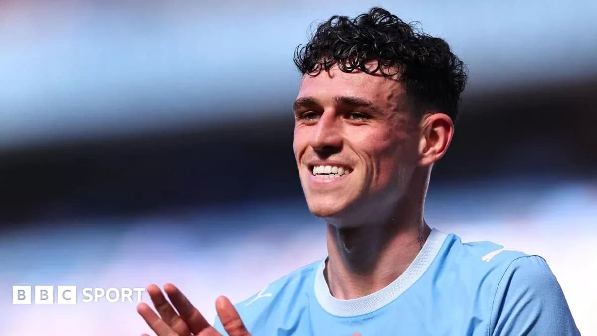 Player smiling and applauding during match celebration Player smiling and applauding during match celebration