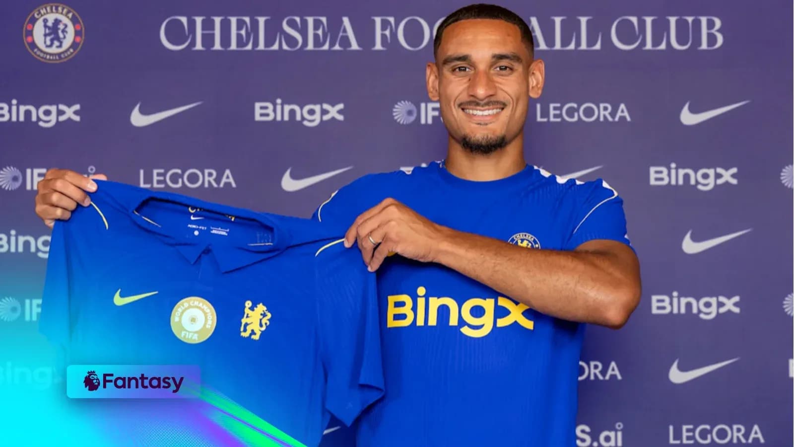 Player holding Chelsea FC jersey at presentation Player holding Chelsea FC jersey at presentation