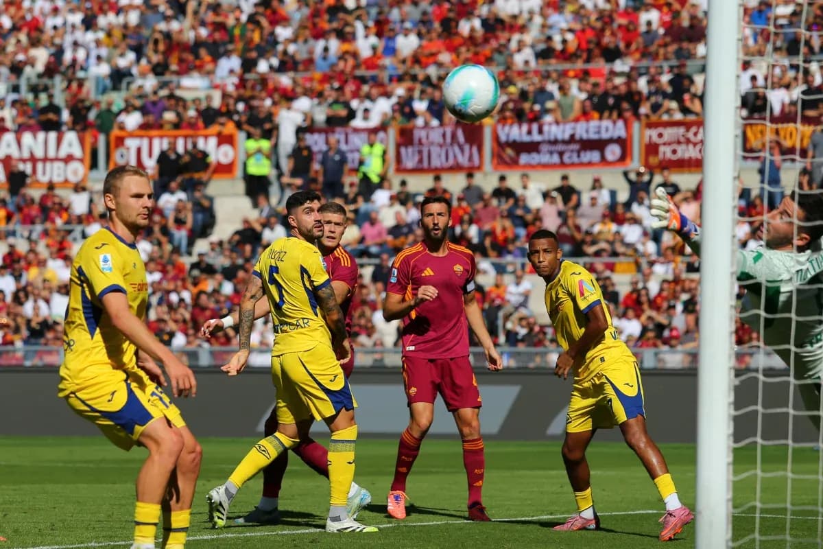 Players competing for the ball during Serie A match Players competing for the ball during Serie A match