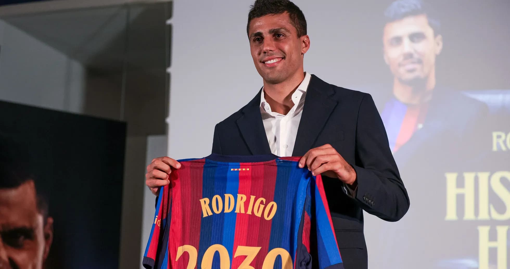 Player holding Barcelona jersey with name and number Player holding Barcelona jersey with name and number