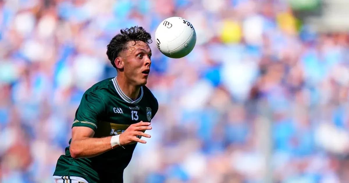 Player reaching for the ball during a match Player reaching for the ball during a match