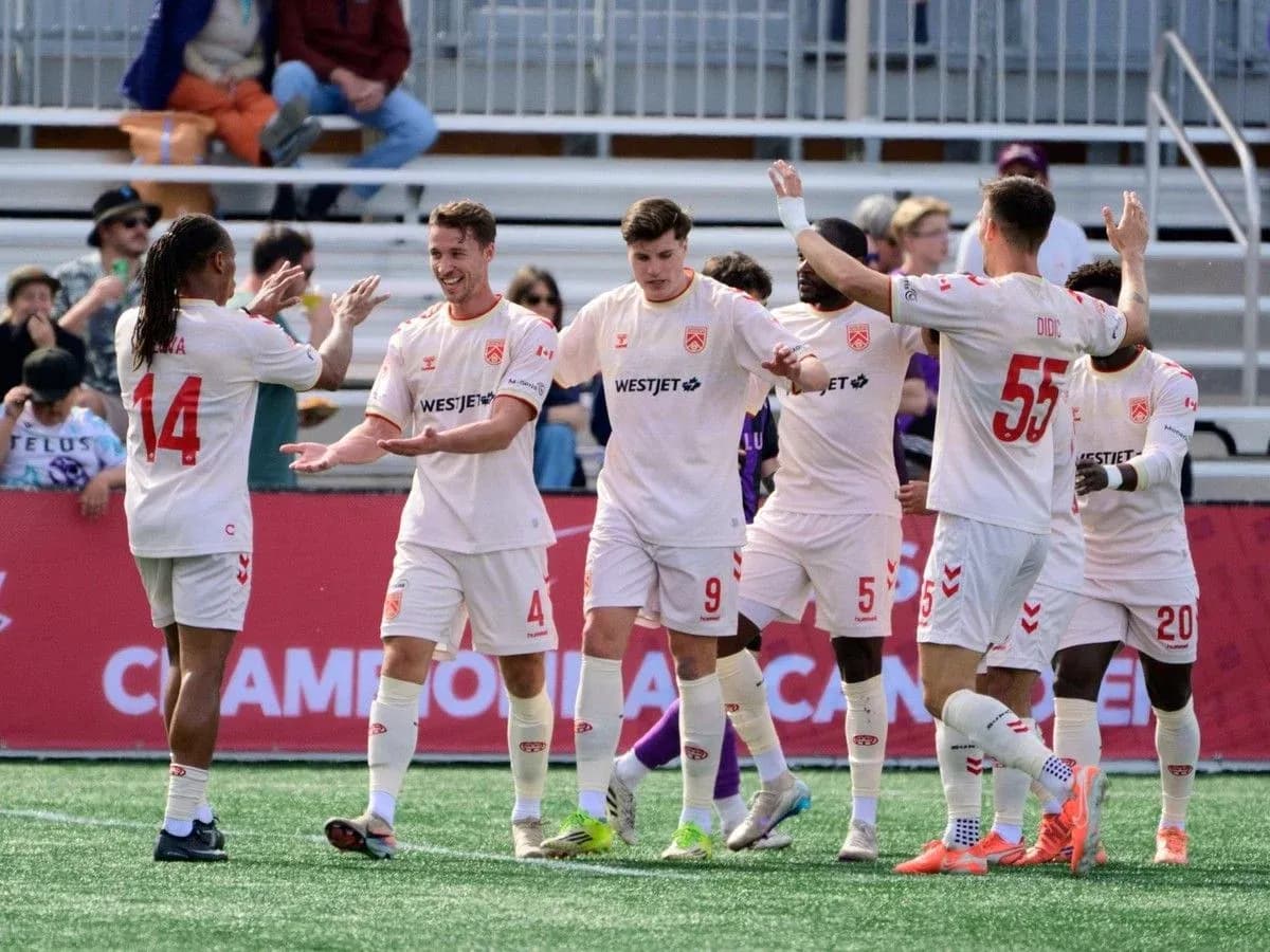 Cavalry FC players celebrating a goal Cavalry FC players celebrating a goal