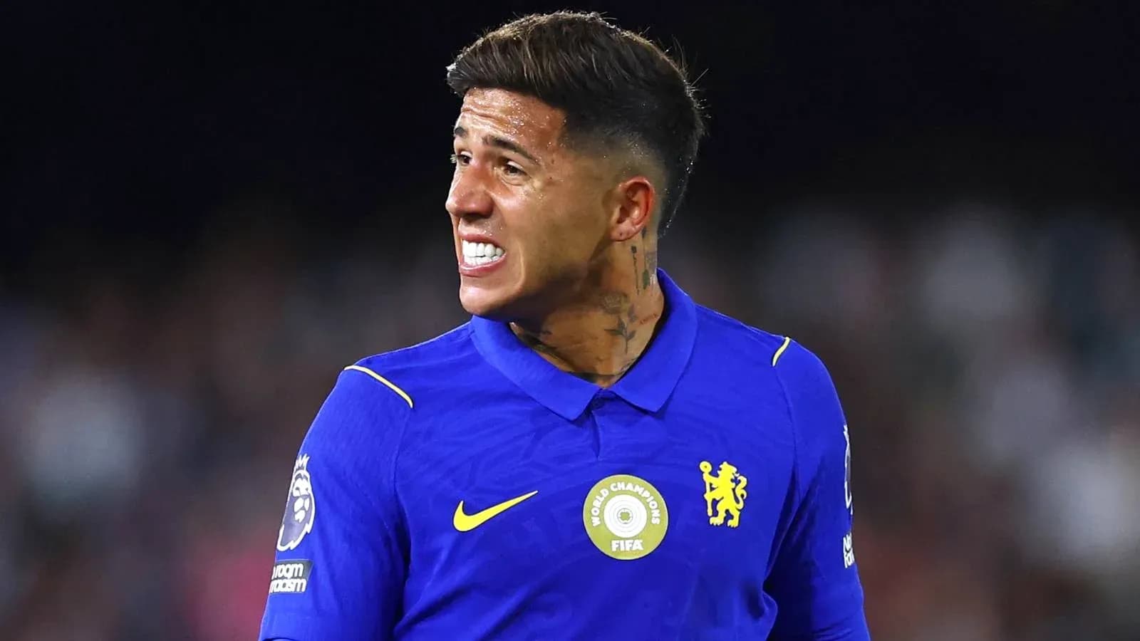 Player in blue jersey reacting during match Player in blue jersey reacting during match