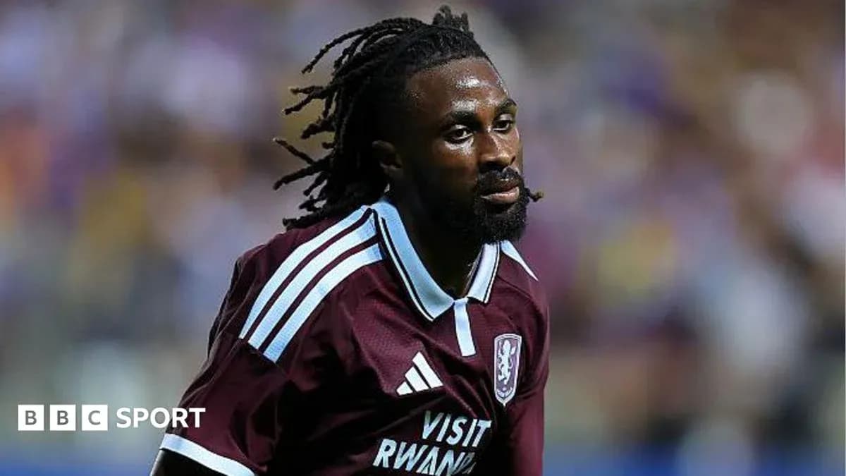 Player wearing maroon jersey during match action Player wearing maroon jersey during match action