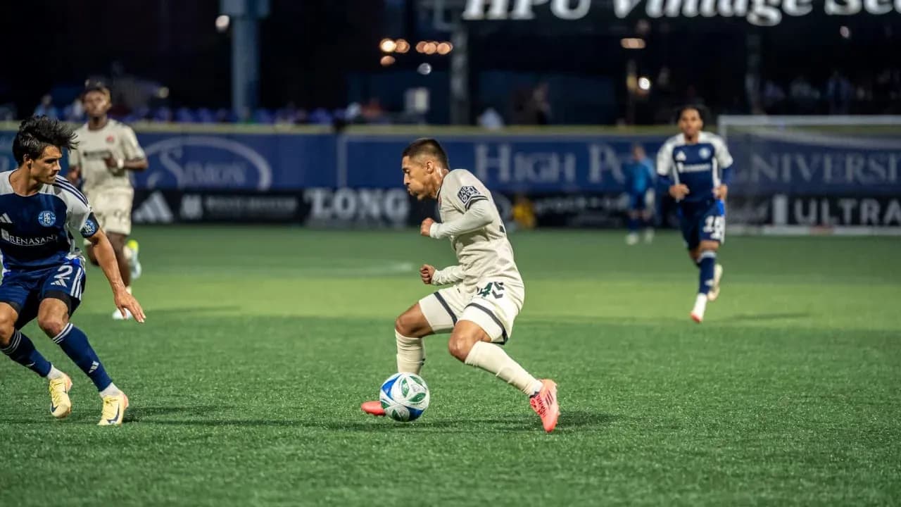 Player dribbling the ball during match Player dribbling the ball during match