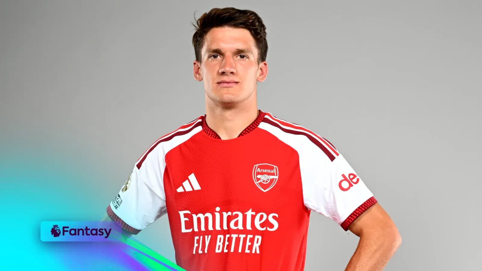 Player in Arsenal jersey posing for photo Player in Arsenal jersey posing for photo
