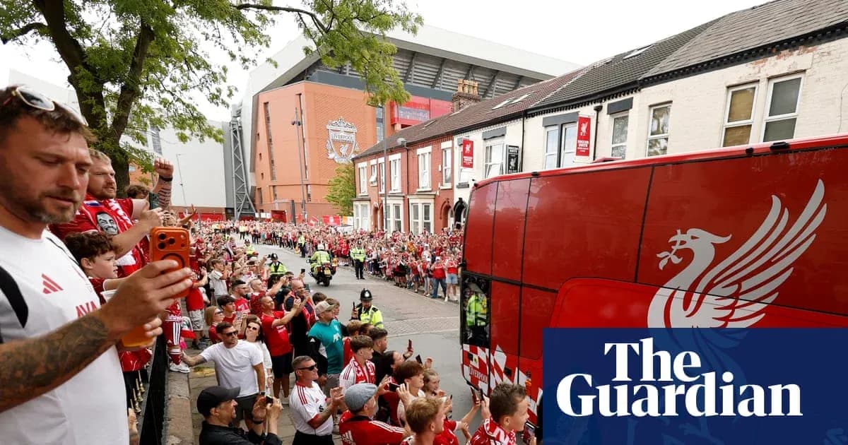 Fans cheering as Liverpool team bus arrives at stadium Fans cheering as Liverpool team bus arrives at stadium