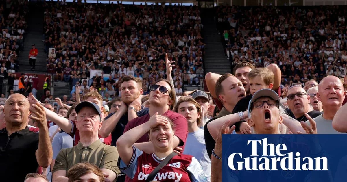 Crowd of fans reacting during a football match Crowd of fans reacting during a football match