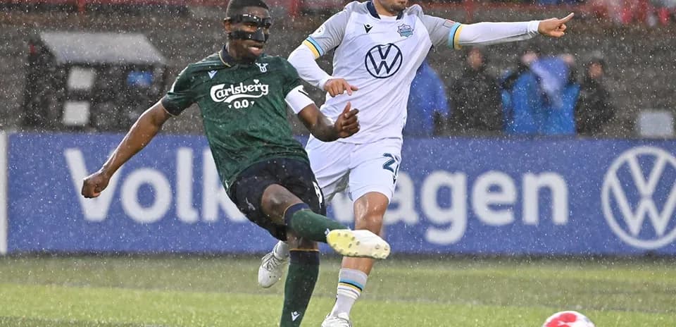 Player kicking ball during York United match Player kicking ball during York United match