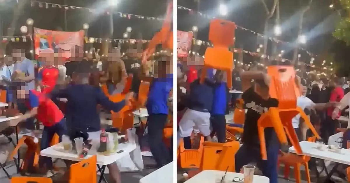 Crowd throwing chairs during a chaotic celebration Crowd throwing chairs during a chaotic celebration