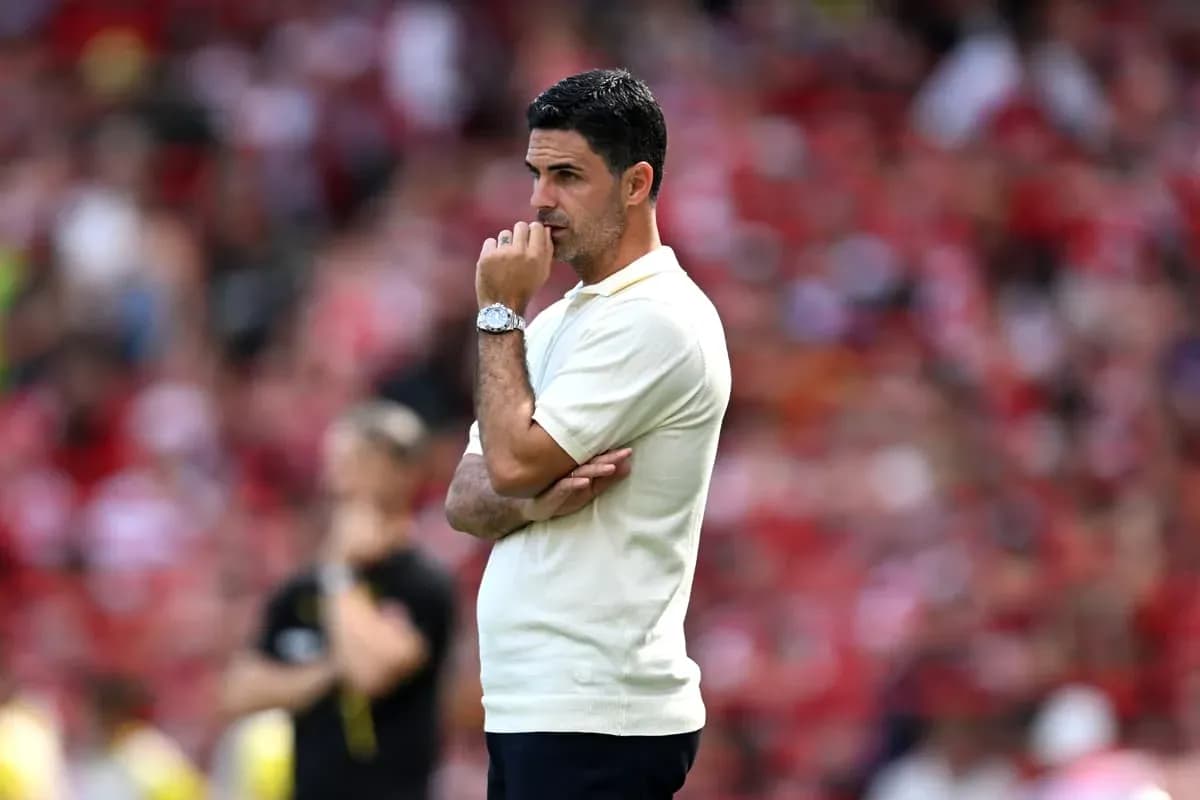 Coach observing match with hand on chin Coach observing match with hand on chin