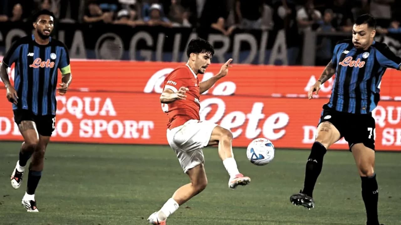 Player striking the ball during a match action Player striking the ball during a match action