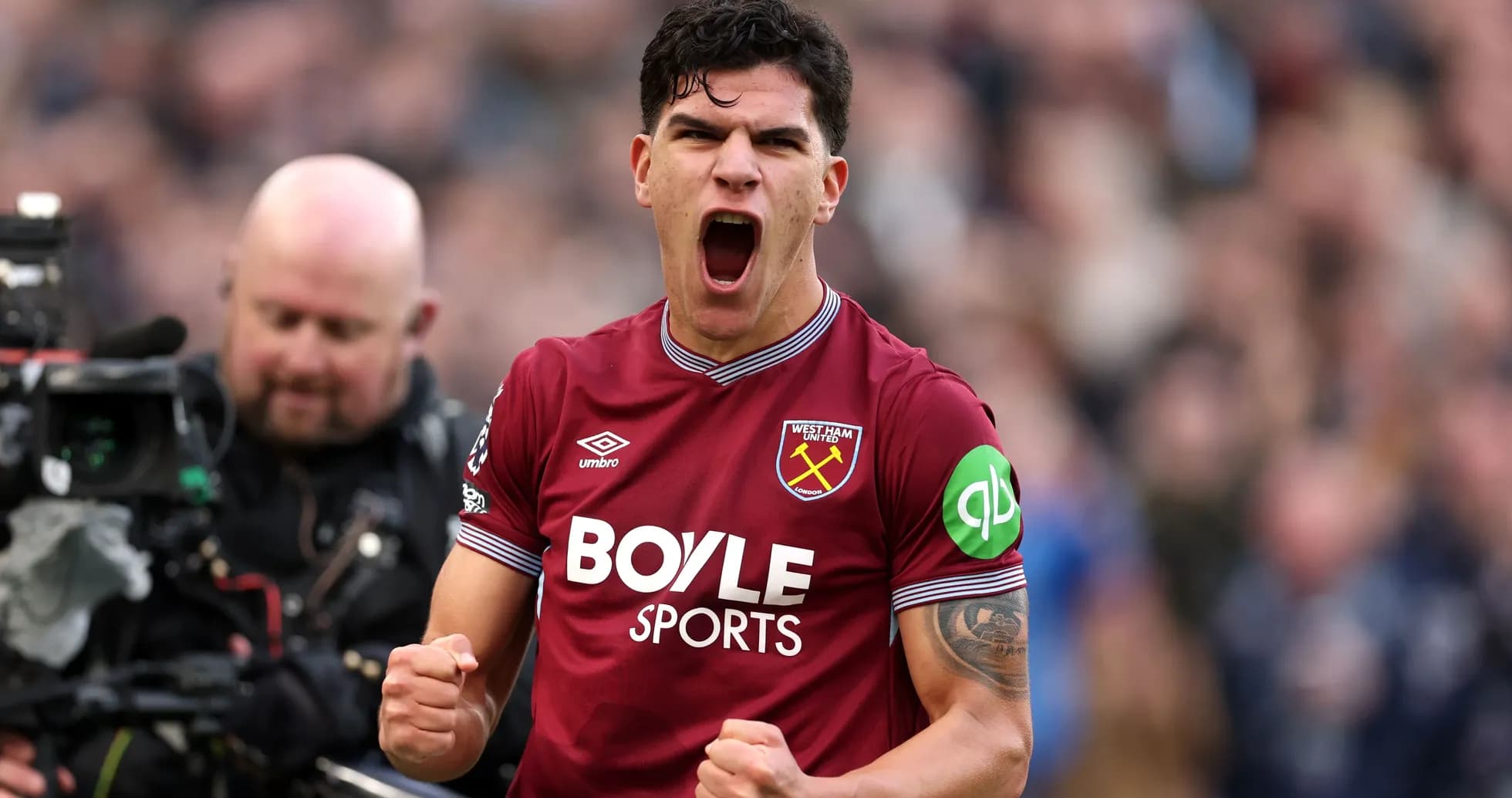 West Ham United player celebrating with clenched fist West Ham United player celebrating with clenched fist