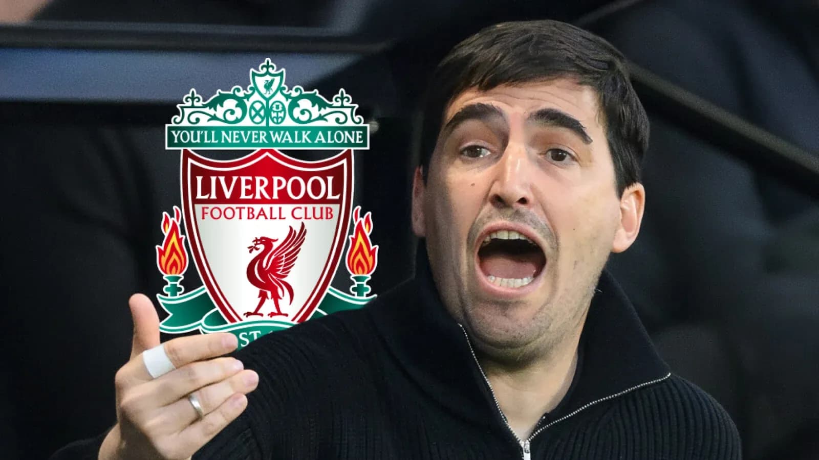 Coach gesturing during match with Liverpool logo background Coach gesturing during match with Liverpool logo background