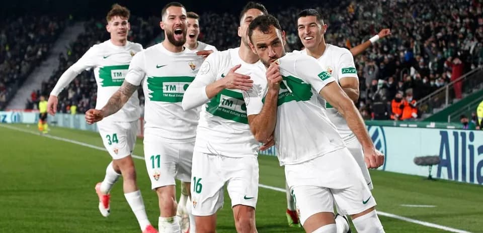 Elche players celebrating a goal during match Elche players celebrating a goal during match
