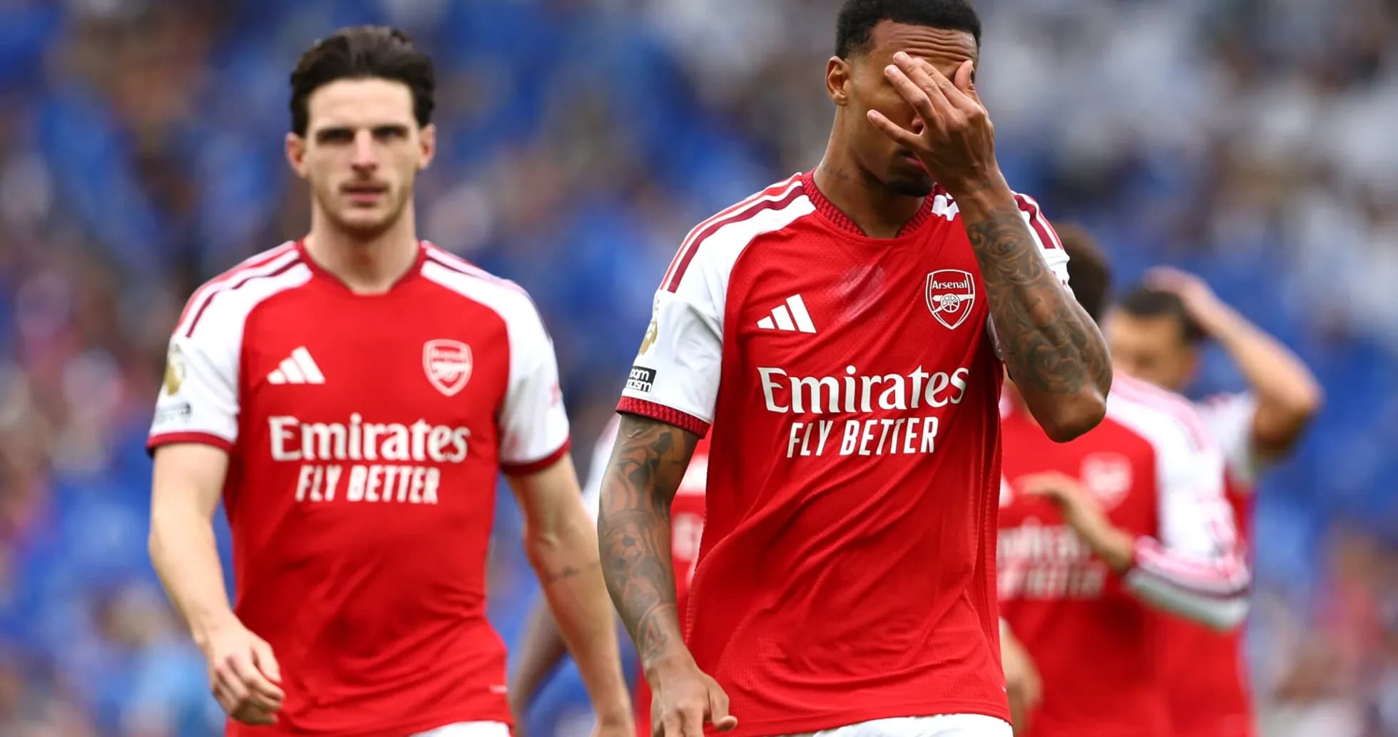 Arsenal players walking off after a match Arsenal players walking off after a match