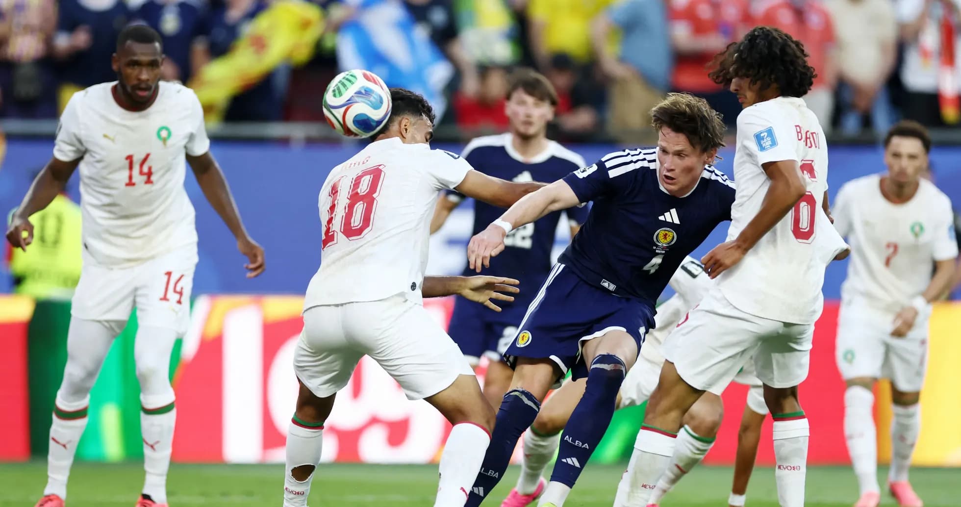 Scotland and Morocco players battling for the ball Scotland and Morocco players battling for the ball