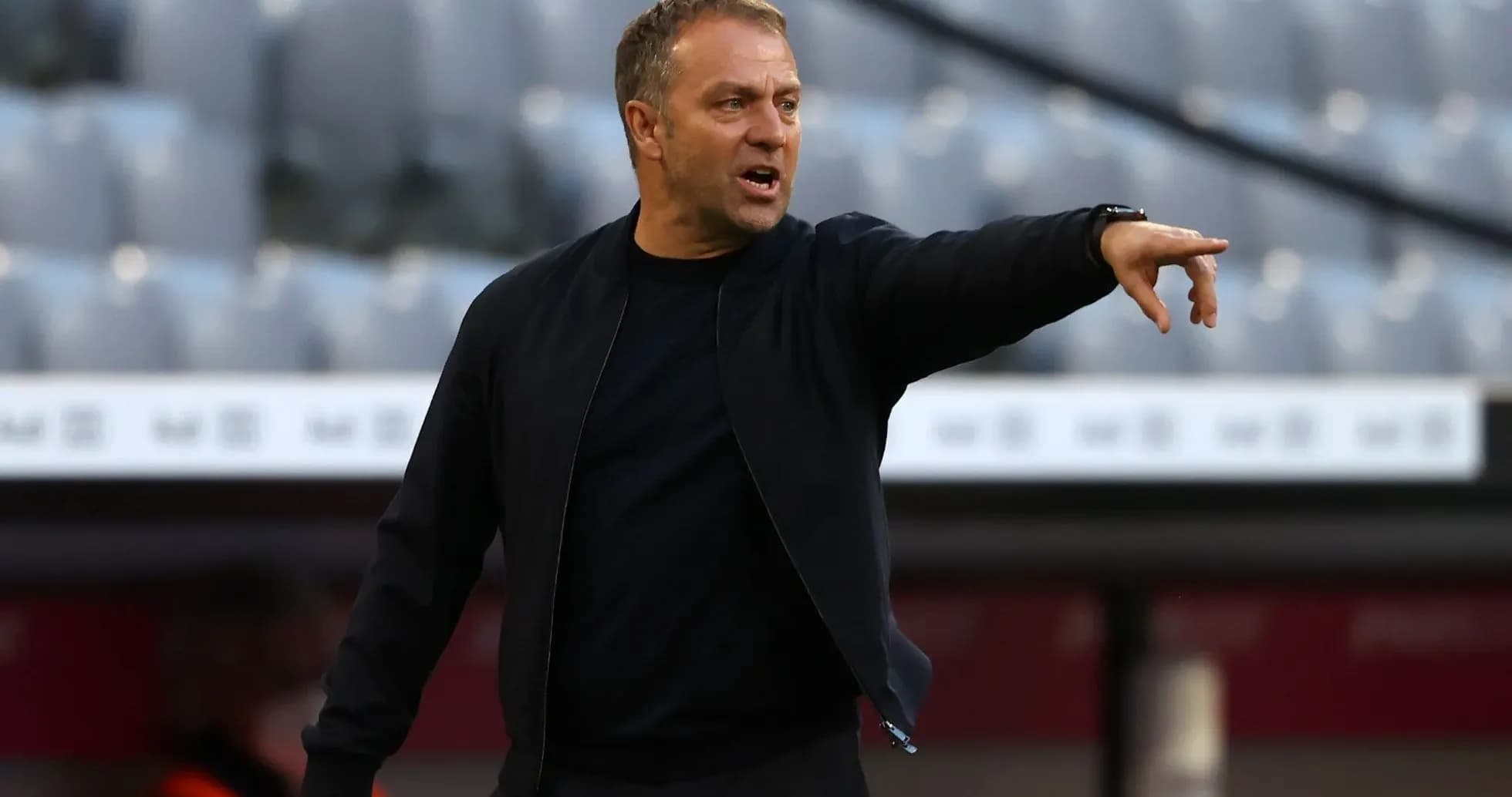 Coach gesturing during a match from the sidelines Coach gesturing during a match from the sidelines