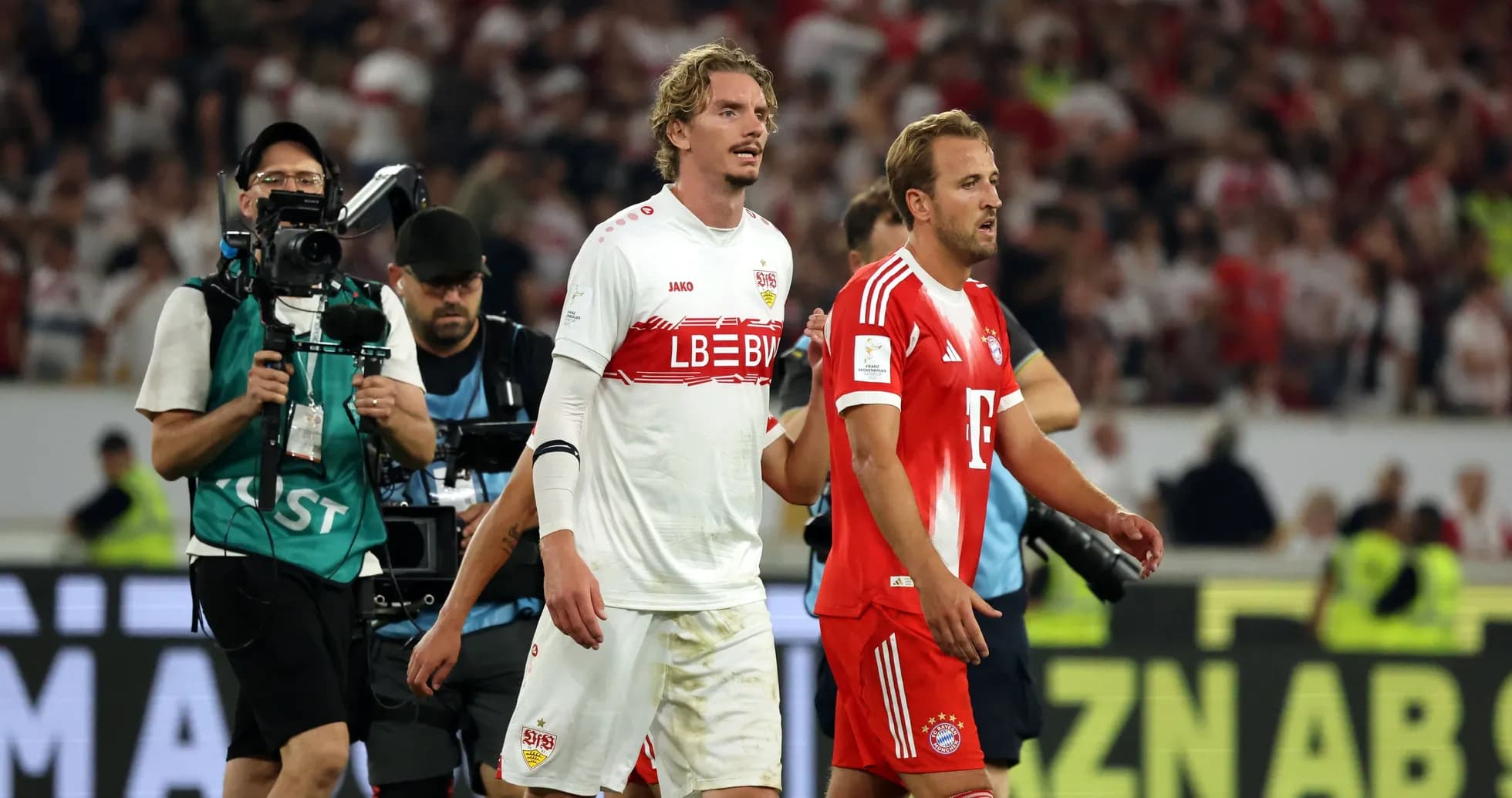 Players walking off the pitch after the match Players walking off the pitch after the match