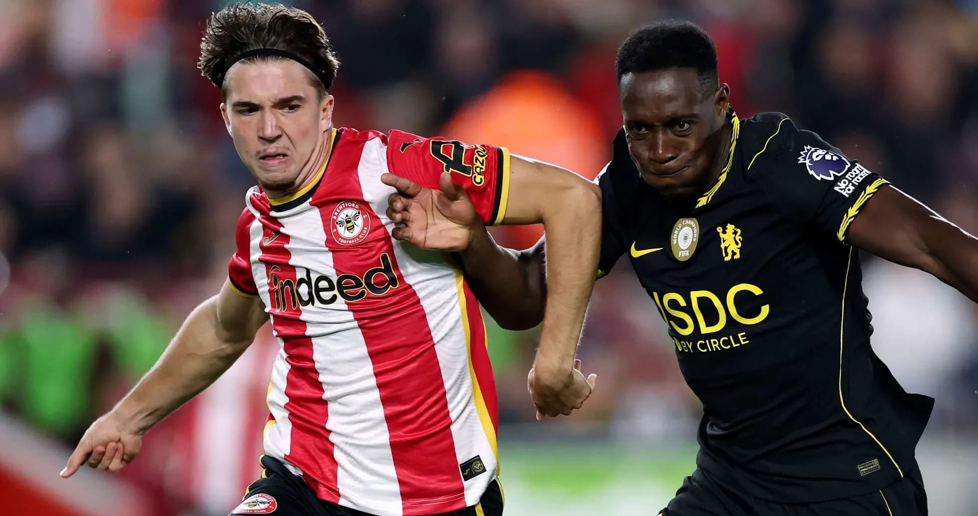 Brentford player competing against Chelsea opponent Brentford player competing against Chelsea opponent