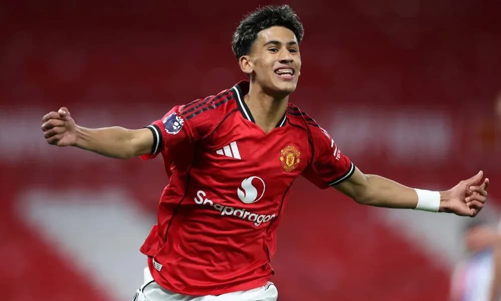 Player celebrating goal in Manchester United kit Player celebrating goal in Manchester United kit