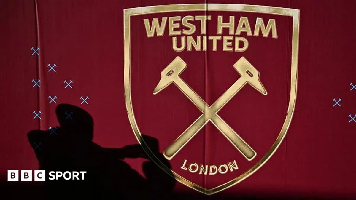 West Ham United logo displayed on a red background West Ham United logo displayed on a red background