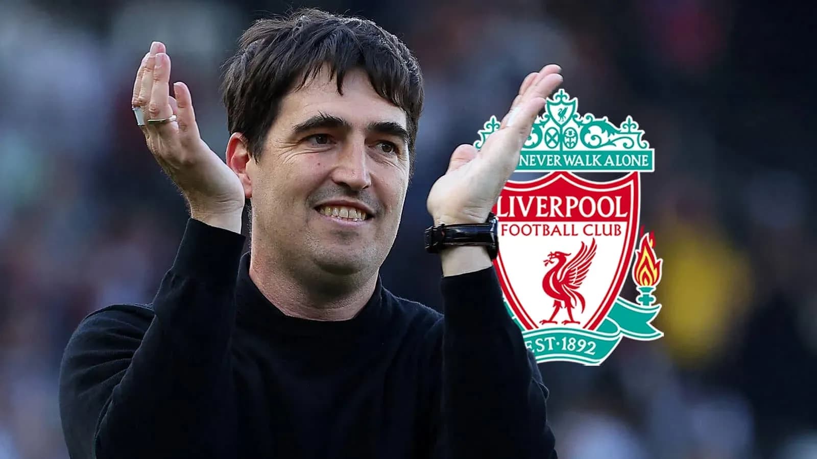 Coach applauding with Liverpool FC logo in background Coach applauding with Liverpool FC logo in background